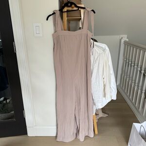 Crinkled jumpsuit with adjustable tie straps and pockets